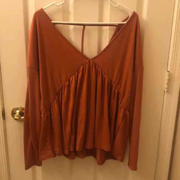 Burnt orange flowy top. - Picture 1 of 3